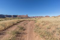 Utah Road: Dirt, Gravel, and Mountain Landscape