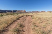 Utah Road: Dirt, Gravel, and Mountain Landscape