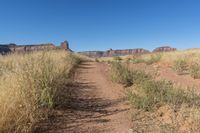 Utah Road: Dirt, Gravel, and Mountain Landscape