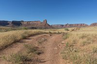 Utah Road: Dirt, Gravel, and Mountain Landscape