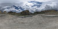 a panoramic picture shows the curve in the desert in this photo taken using a 360 camera