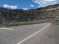 Utah Road Landscape: Mountains and Clouds