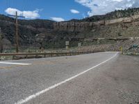 Utah Road Landscape: Mountains and Clouds