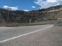 Utah Road Landscape: Mountains and Clouds