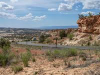 Utah Road: Picturesque Landscape with Fluffy Clouds