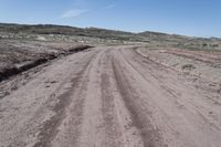 Utah Road through Rugged Landscape and Red Rock