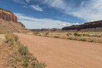 Utah Road through Sand Desert and Red Rock