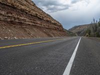 Utah Road Through a Gloomy Forest