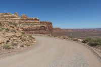 Utah Road: Traveling Through Red Rock Landscape