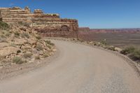 Utah Road: Traveling Through Red Rock Landscape