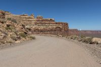 Utah Road: Traveling Through Red Rock Landscape