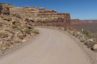 Utah Road: Traveling Through Red Rock Landscape