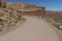 Utah Road: Traveling Through Red Rock Landscape