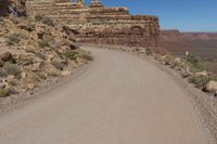 Utah Road: Traveling Through Red Rock Landscape