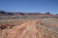 Rugged Brown Landscape in Utah, Under a Clear Sky