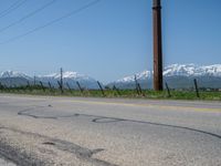 Utah's Rural Landscape: Snowy Mountains and Snow-Covered Fields