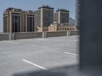 a parking lot and wall are pictured in a photo from the perspective point of view