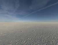 there is a view of a vast snow field taken from the inside out of focus