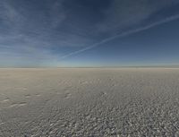 there is a view of a vast snow field taken from the inside out of focus