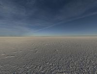 there is a view of a vast snow field taken from the inside out of focus