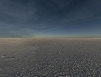 there is a view of a vast snow field taken from the inside out of focus