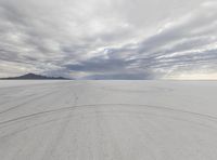 there are many tracks in the snow in this photo, and there is no image here