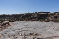 a rocky outcropping is shown on the mountain top in arizona's moab