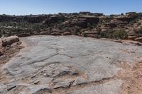 a rocky outcropping is shown on the mountain top in arizona's moab