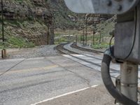 Road in Utah, USA: Surrounded by Mountains and Clouds