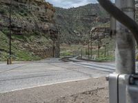 Road in Utah, USA: Surrounded by Mountains and Clouds