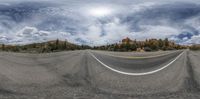 the view from the top of a desert highway from a fish eye lens point - shift