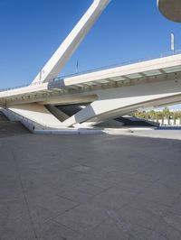 an image of the underside of the building of a building in barcelona, spain with concrete floors and arches