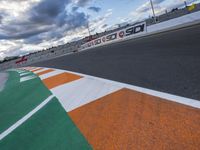 Valencia Race Track: Asphalt, Day, and Clouds