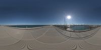 a 360 - vision image looking over the water at the dock at the marina area