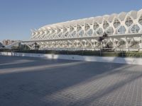 the building is very modern and has large windows that provide natural light to it's surroundings