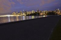 Vancouver Cityscape: Night View of Illuminated Skyscrapers