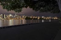 Vancouver Cityscape: Night View of Illuminated Skyscrapers