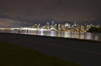 Vancouver Cityscape: Night View of Illuminated Skyscrapers