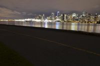Vancouver Cityscape: Night View of Illuminated Skyscrapers