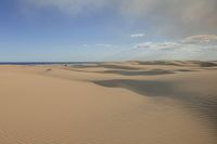 Vast Landscape: Sand Dunes Stretch to the Horizon