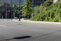 the street signs indicate an arrow in the road that is empty on the side of the road