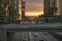 Vibrant City Skyline with Sunrise Reflection