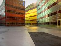 the empty area with the building reflected in it is a vibrant glow of sunlight and color