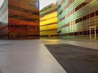 the empty area with the building reflected in it is a vibrant glow of sunlight and color