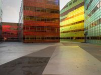 the empty area with the building reflected in it is a vibrant glow of sunlight and color