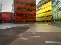 the empty area with the building reflected in it is a vibrant glow of sunlight and color