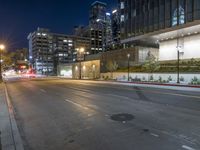 Vibrant Cityscape at Night: Lit Buildings, Street Lights 002