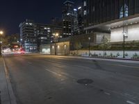 Vibrant Cityscape at Night: Lit Buildings and Street Lights (003)