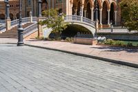 a view of the steps and sidewalks in front of an ornate building in this country town