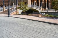 a view of the steps and sidewalks in front of an ornate building in this country town